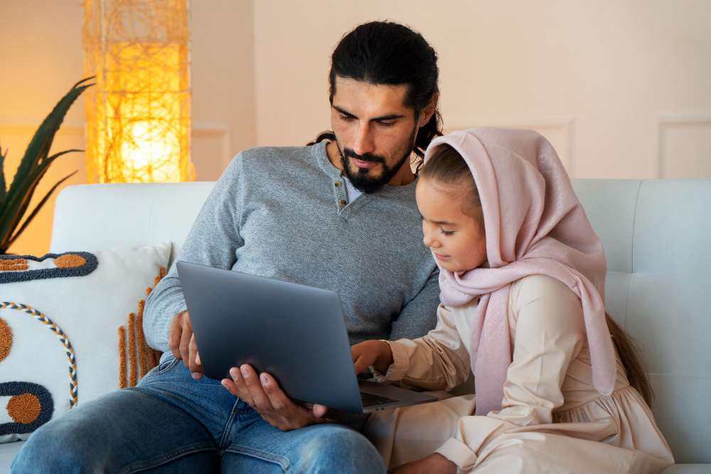 Muslim child learning Quran with parent